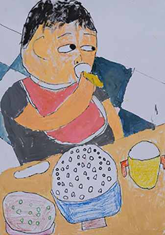 弟がごはんをパクパク